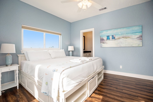 bedroom featuring dark hardwood / wood-style flooring and ceiling fan