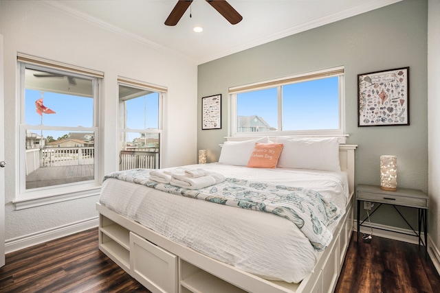 bedroom featuring ceiling fan, dark hardwood / wood-style floors, and ornamental molding