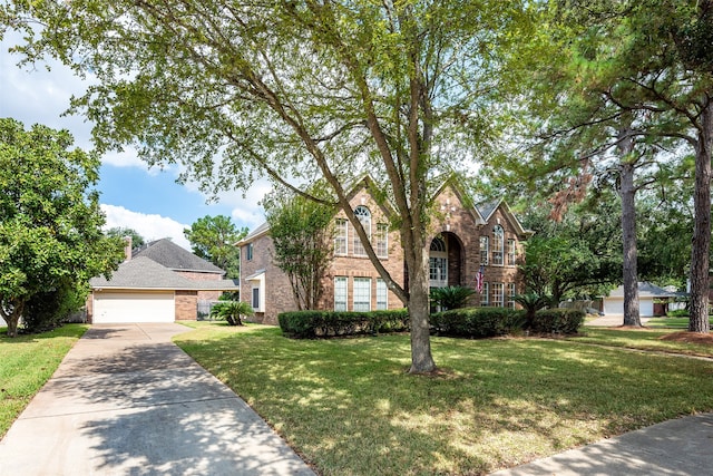 tudor home with a front yard