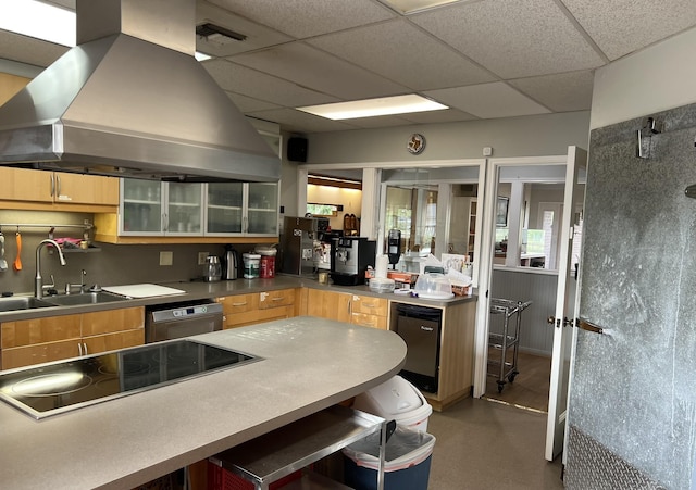 kitchen with dishwasher, sink, island exhaust hood, black electric cooktop, and a paneled ceiling