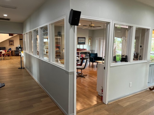 corridor featuring hardwood / wood-style flooring