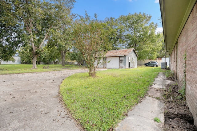 view of yard with a garage