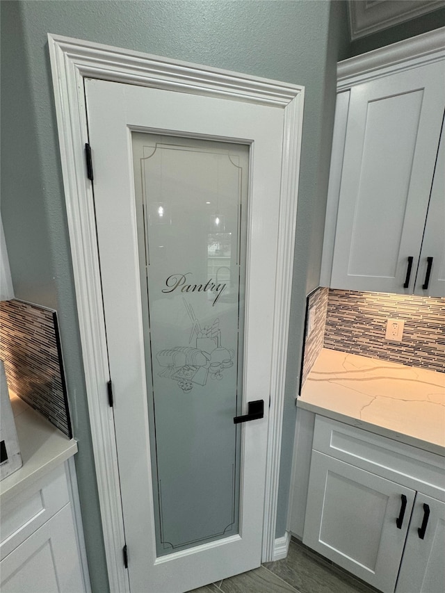 doorway to outside with dark wood-type flooring