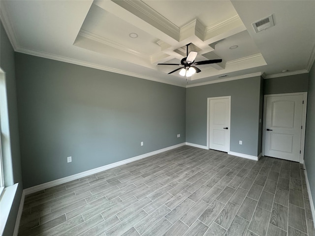 unfurnished bedroom featuring ornamental molding, a raised ceiling, coffered ceiling, ceiling fan, and light hardwood / wood-style flooring