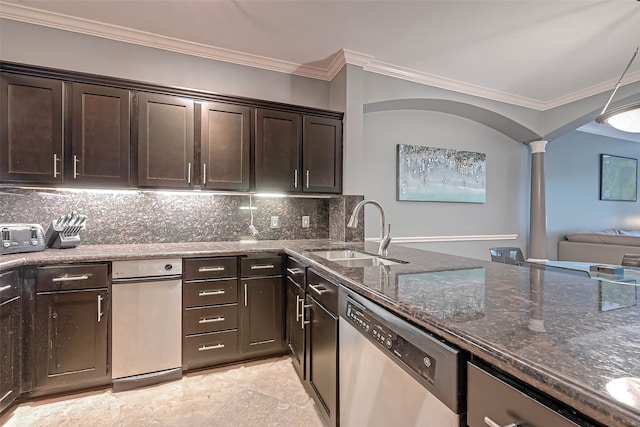 kitchen featuring ornamental molding, dark brown cabinetry, sink, decorative columns, and stainless steel dishwasher