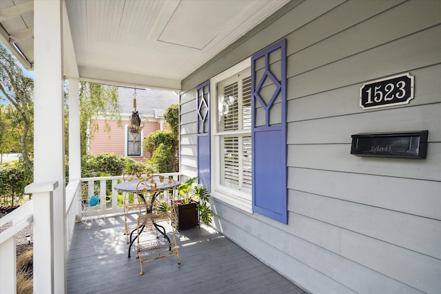 wooden deck featuring a porch