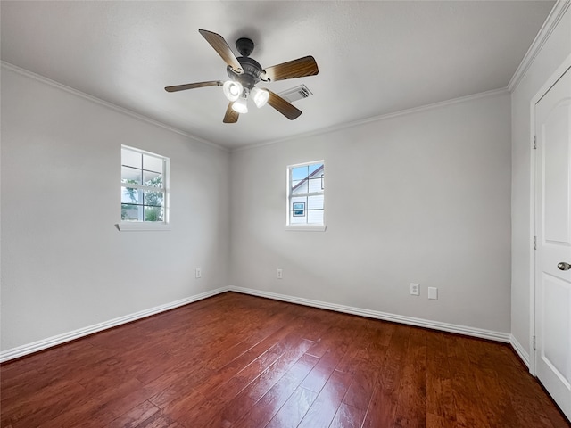 spare room with dark hardwood / wood-style flooring, ornamental molding, and ceiling fan