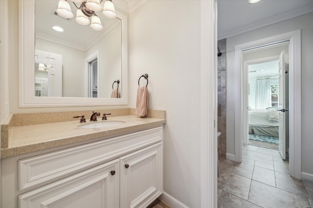 bathroom featuring crown molding, tile patterned flooring, vanity, and an inviting chandelier