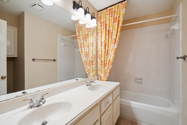 bathroom with vanity, tile patterned floors, and tub / shower combination