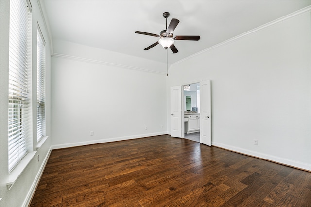 unfurnished room with ceiling fan, dark wood-type flooring, and ornamental molding