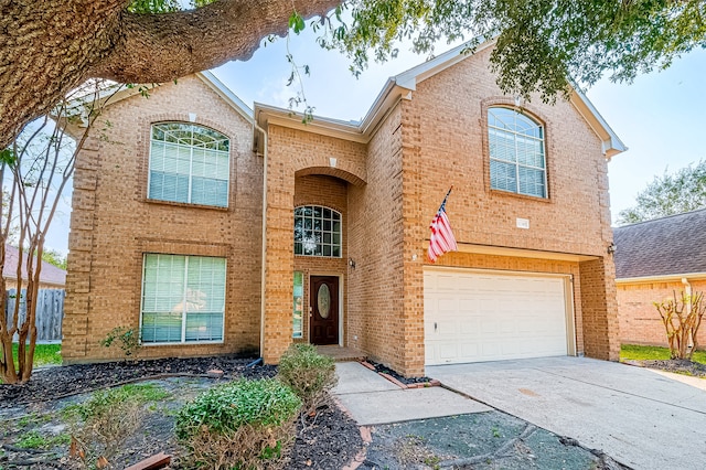 front of property with a garage