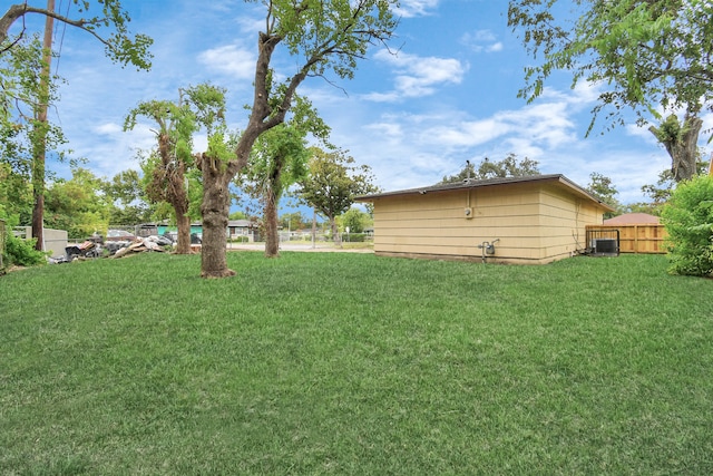 view of yard featuring central AC