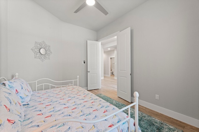 63 Shetland Ln, Coldspring, TX 77331 - bedroom with wood finished floors, baseboards, and ceiling fan
