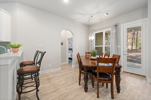 dining room featuring light wood-type flooring