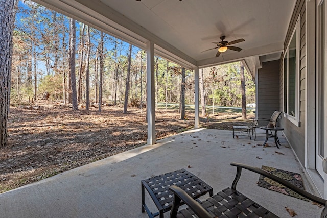 view of patio featuring ceiling fan