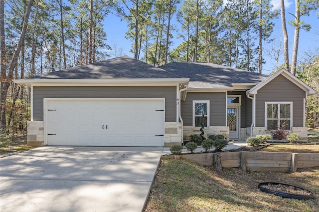 63 Shetland Ln, Coldspring, TX 77331 - single story home featuring stone siding, driveway, an attached garage, and roof with shingles