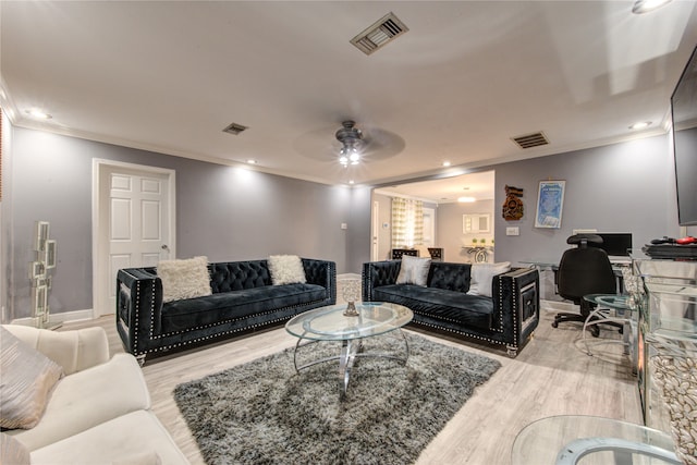 living room with ceiling fan, light wood-type flooring, and crown molding