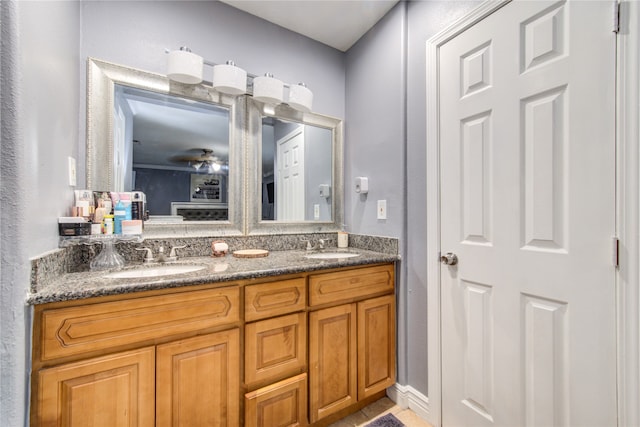 bathroom featuring vanity and ceiling fan