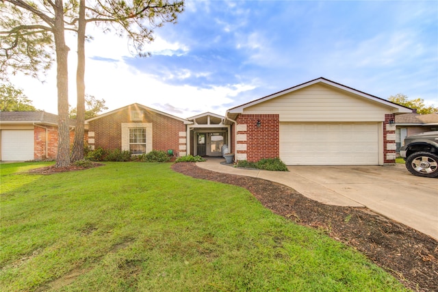 ranch-style home with a garage and a front lawn