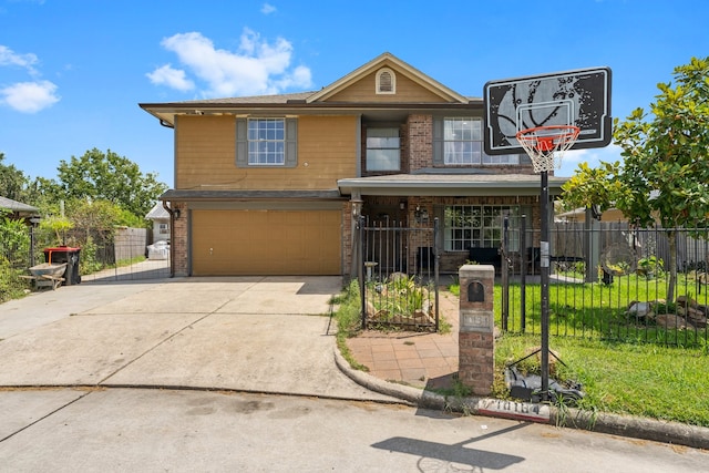 view of front property featuring a garage and a front yard