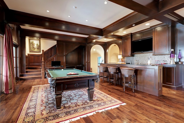 game room featuring crown molding, beam ceiling, coffered ceiling, dark wood-type flooring, and billiards