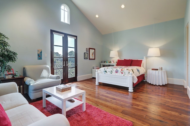 bedroom featuring high vaulted ceiling, french doors, and dark hardwood / wood-style floors