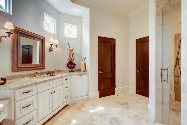 bathroom featuring vanity, a healthy amount of sunlight, a shower, and crown molding