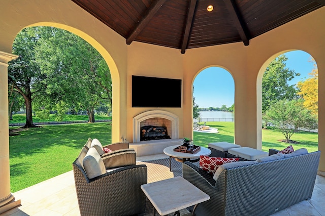 view of patio / terrace featuring an outdoor living space with a fireplace