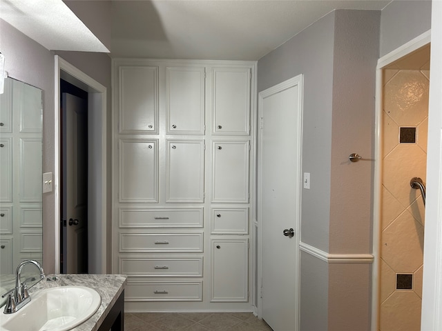 bathroom featuring vanity and tile patterned floors