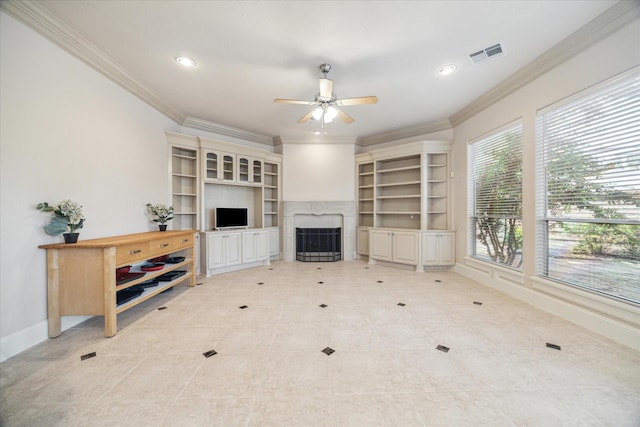 living room with tile patterned flooring, crown molding, and ceiling fan