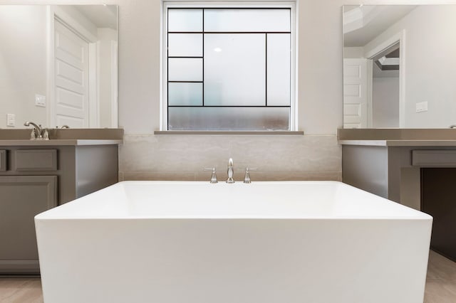 bathroom featuring a bathtub and vanity