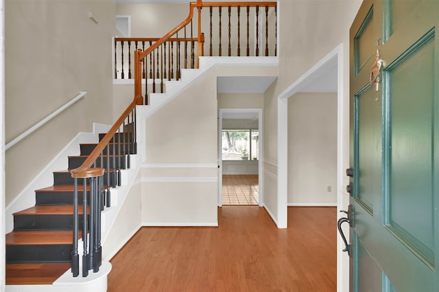 foyer entrance with light wood-type flooring