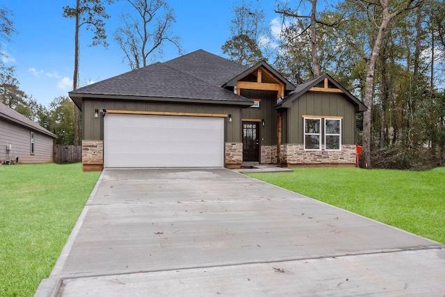 craftsman-style home featuring a garage and a front yard