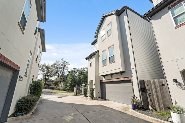 view of side of property with a garage