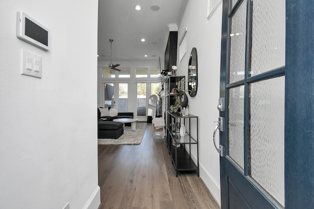 corridor featuring dark hardwood / wood-style floors