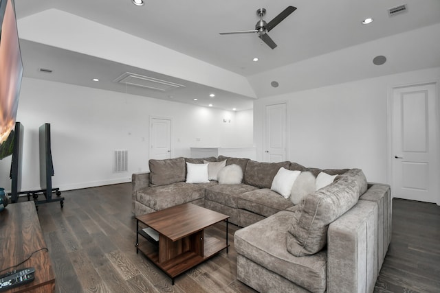 living room featuring dark wood-type flooring, ceiling fan, and lofted ceiling