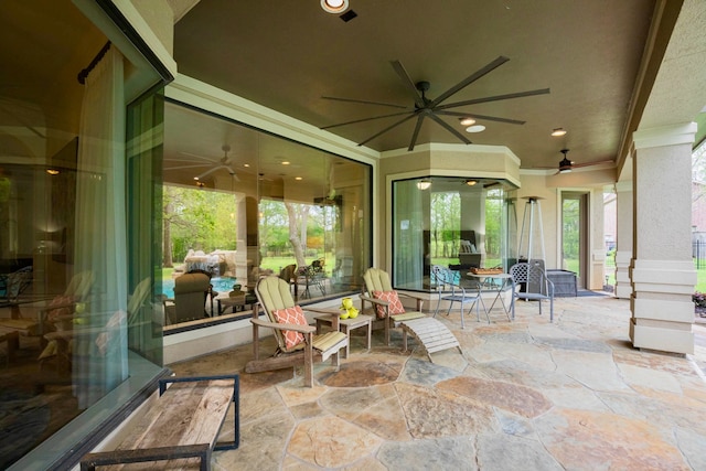 view of patio / terrace featuring ceiling fan