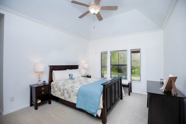 carpeted bedroom featuring ceiling fan, lofted ceiling, and ornamental molding