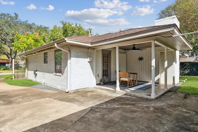 exterior space with a patio area and ceiling fan