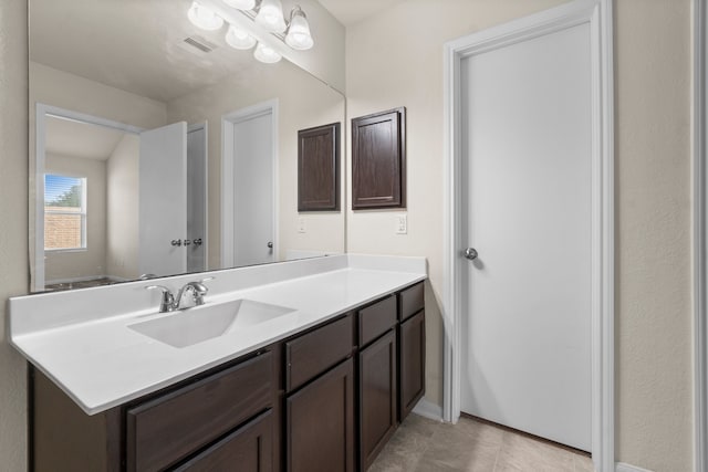 bathroom featuring vanity