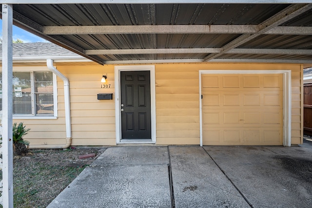 property entrance featuring a garage