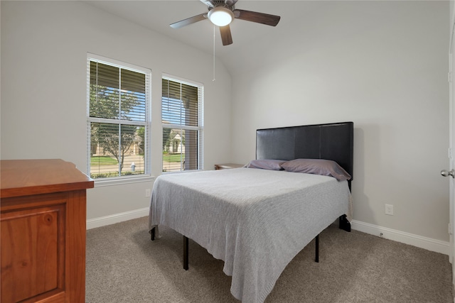 bedroom featuring light colored carpet, ceiling fan, and vaulted ceiling