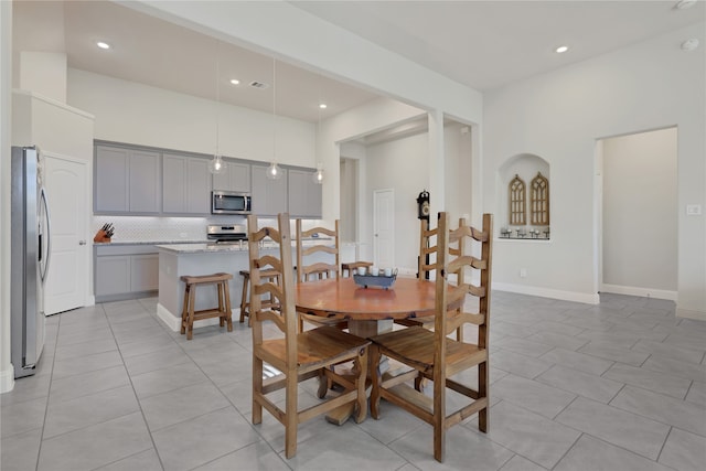 dining room with light tile patterned floors