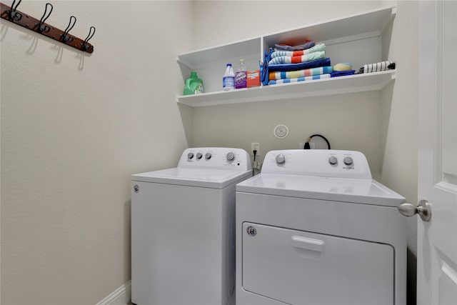 laundry area with separate washer and dryer