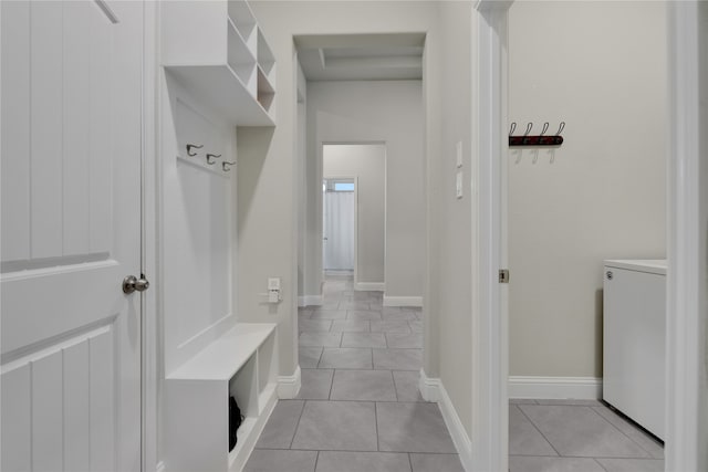 mudroom featuring light tile patterned flooring