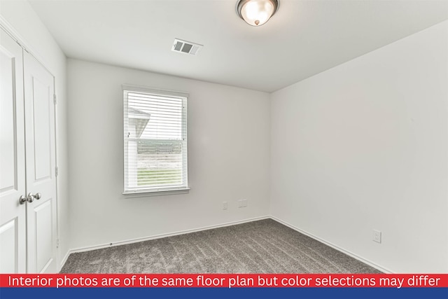 view of carpeted spare room