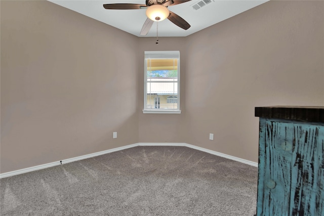 unfurnished living room with carpet flooring and ceiling fan