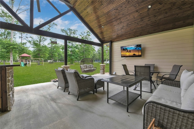 view of patio / terrace featuring a playground and outdoor lounge area