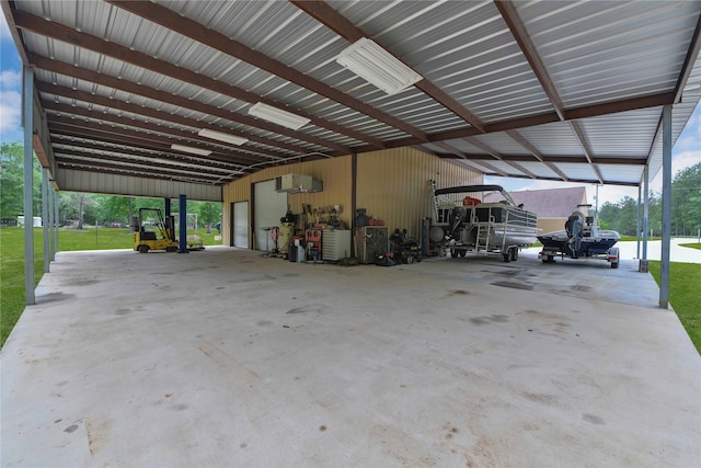 garage featuring a yard