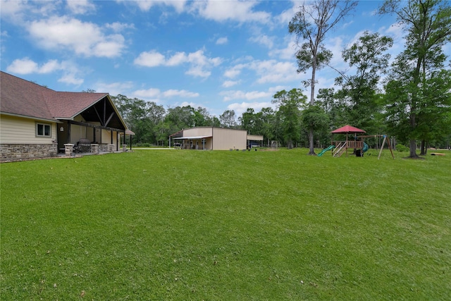 view of yard featuring a playground